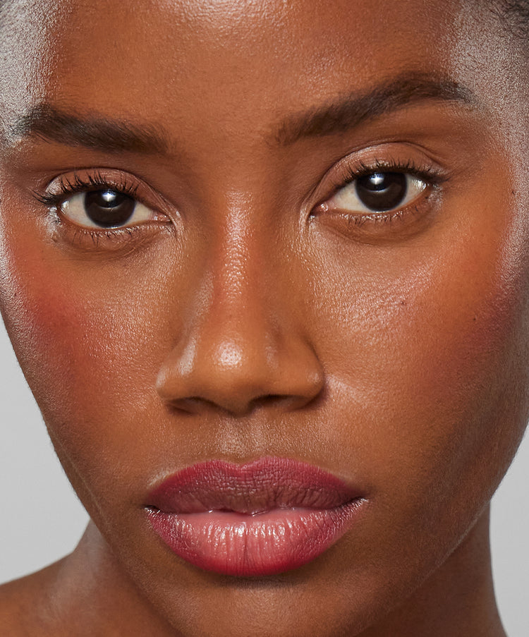| desc: | text: light Model wears Lip Sculpt in Red
